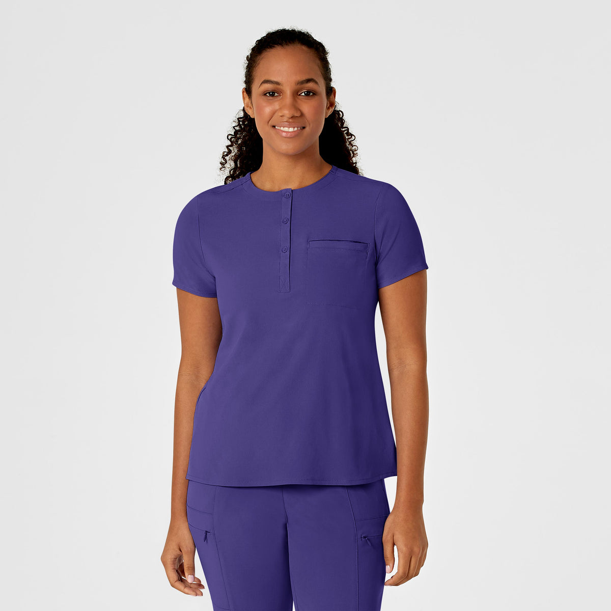 Blouse médicale WonderWink Renew à une poche et col mandarin, à rentrer dans le pantalon.