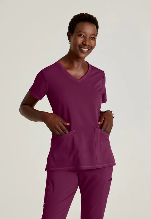 Blusa médica con cuello en V curvo Serena de licra elástica de Grey's Anatomy