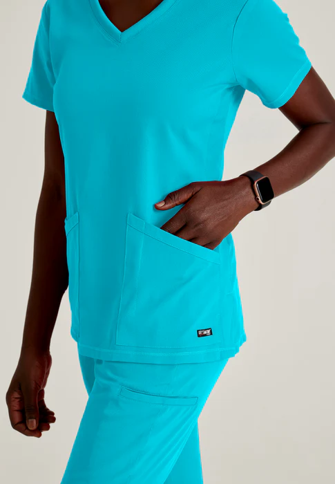 Blusa médica con cuello en V curvo Serena de licra elástica de Grey's Anatomy