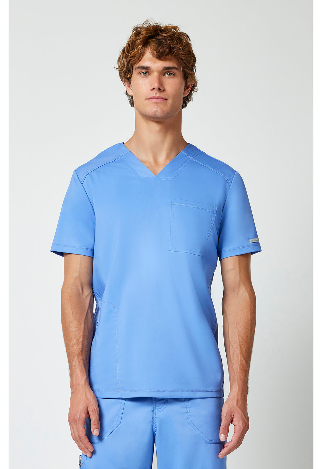 Haut de blouse médicale Cherokee Workwear pour homme, col en V, une poche, à rentrer dans le pantalon.