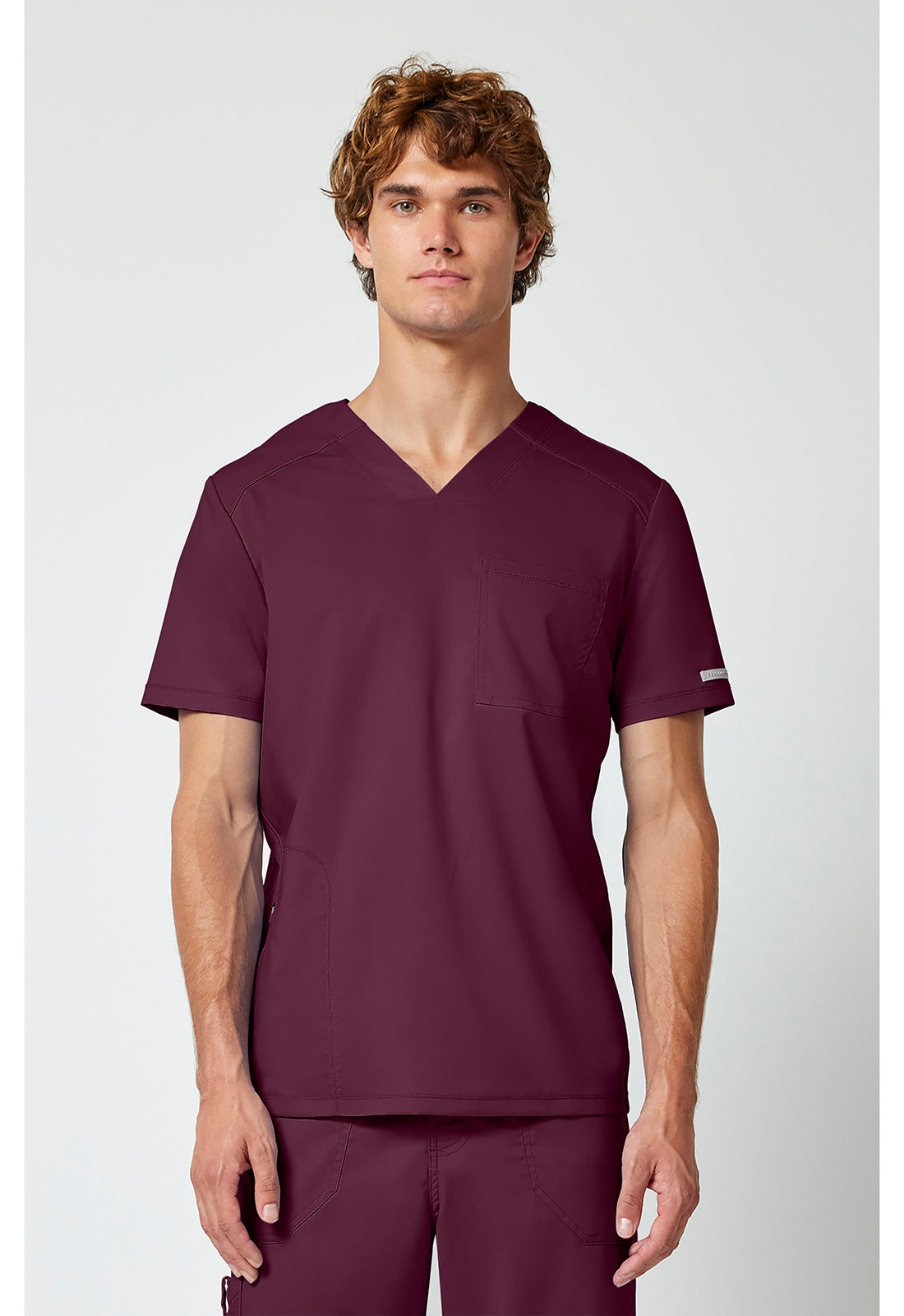 Haut de blouse médicale Cherokee Workwear pour homme, col en V, une poche, à rentrer dans le pantalon.