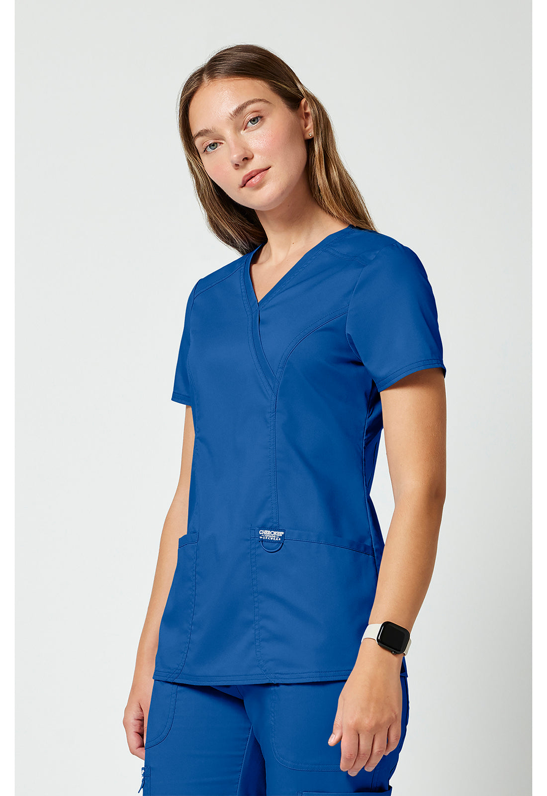 Cherokee Workwear Revolution Mock Wrap Scrub Top with NYC Health + Hospitals | Nursing Logo