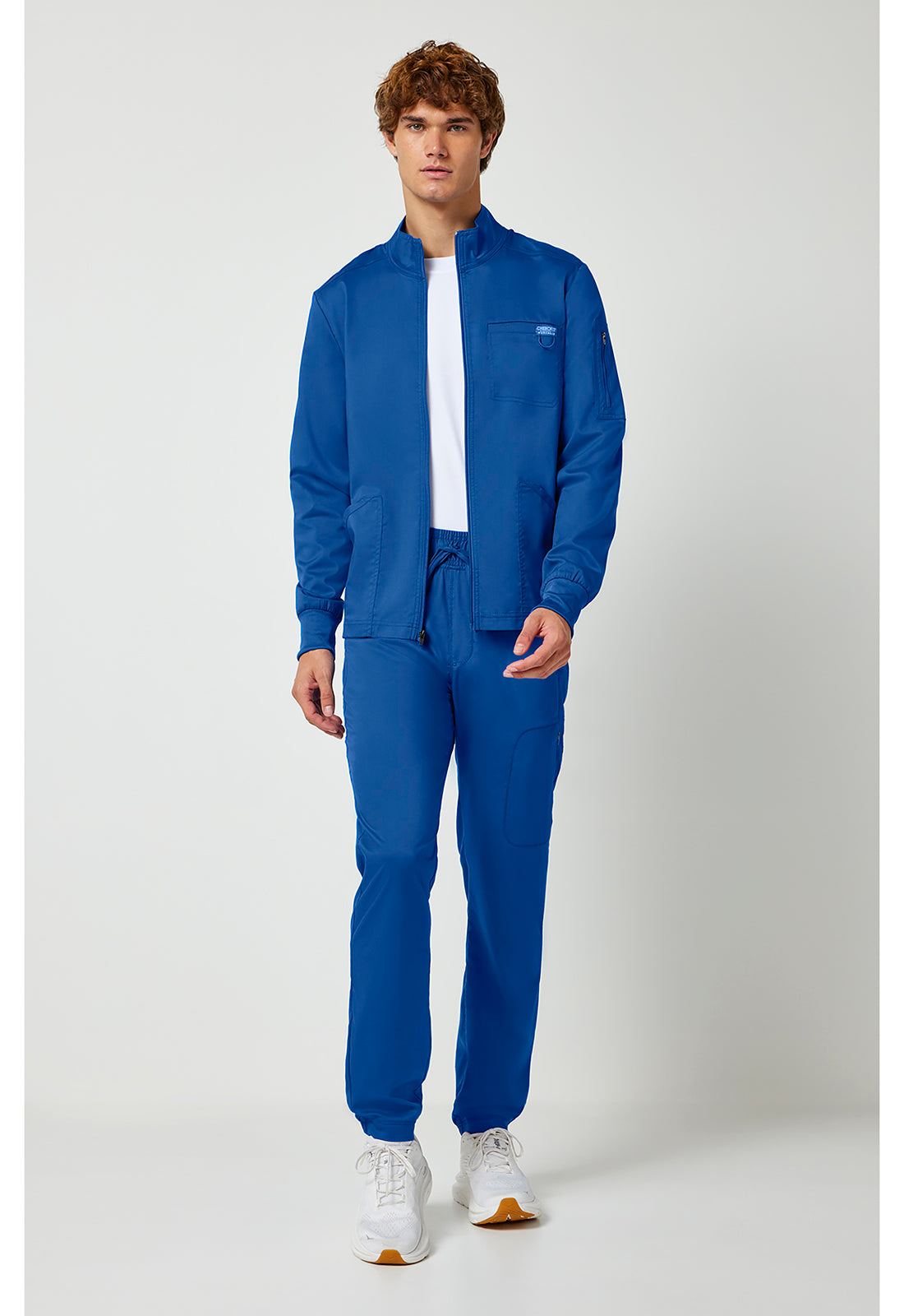 Cherokee Workwear Revolution Mens Zip Front Scrub Jacket with NYC Health + Hospitals | Nursing Logo