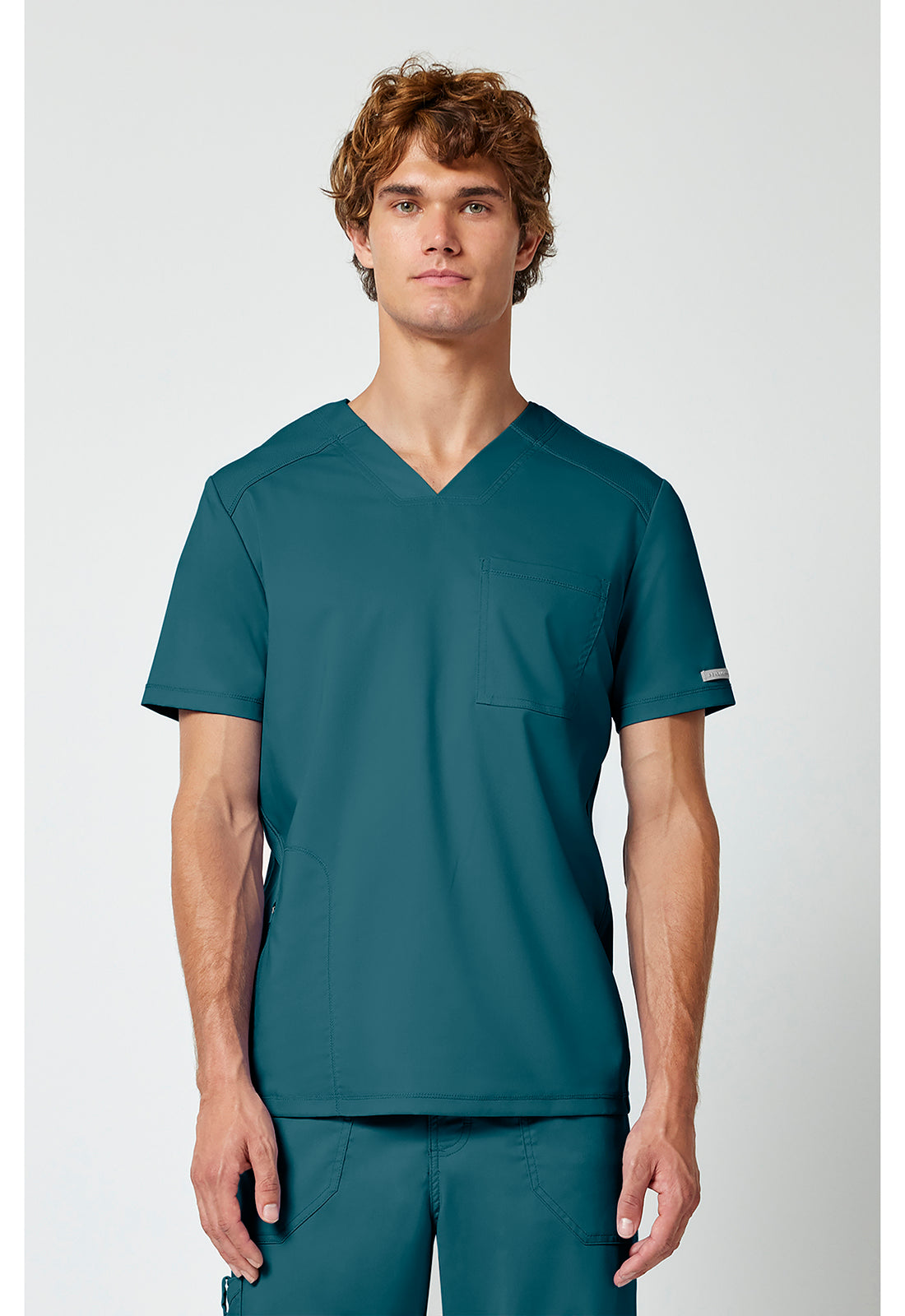 Haut de blouse médicale Cherokee Workwear pour homme, col en V, une poche, à rentrer dans le pantalon.