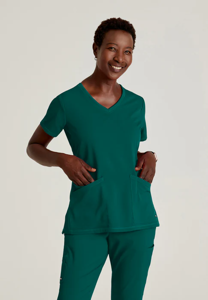 Blusa médica con cuello en V curvo Serena de licra elástica de Grey's Anatomy