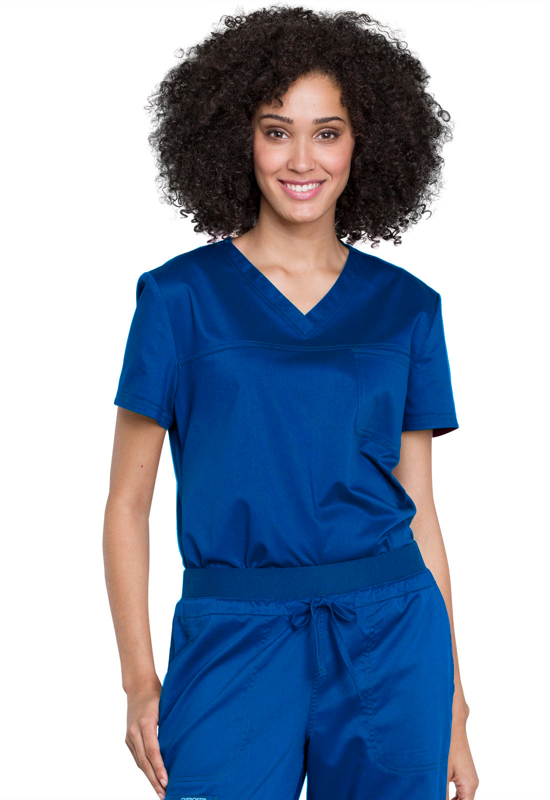 Cherokee Workwear Revolution Womens 1-Pocket Tuck In V-Neck O.R. Scrub Top with NYC Health + Hospitals | Nursing Logo