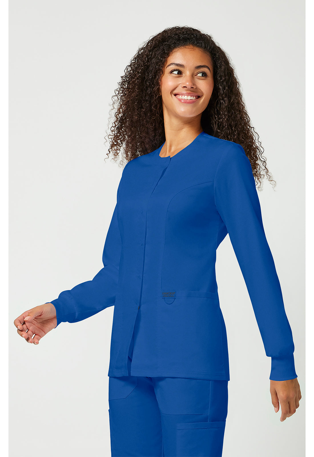 Cherokee Workwear Revolution Womens Snap Front Scrub Jacket with NYC Health + Hospitals | Nursing Logo